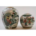 A Chinese porcelain famille verte jar, decorated figures and animals, 19 cm high, and another (2)