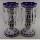 A pair of cased glass lustres, with floral decoration, 26 cm high (2)