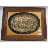 A Continental oval relief panel, depicting Joan of Arc and her troops, signed Justin, 19 x 31 cm