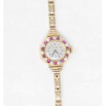 A lady's 18ct gold Precista wristwatch, the white dial with Arabic numerals set in a diamond and