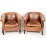 A pair of leather upholstered armchairs, on tapering square legs See illustration Report by RB