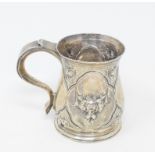 A George II silver christening mug, later embossed flowers and foliage, Richard Bayley, London 1740,