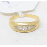 An 18ct gold and five stone diamond ring, approx. ring size M Report by RB Approx. 4.1 g (all in)