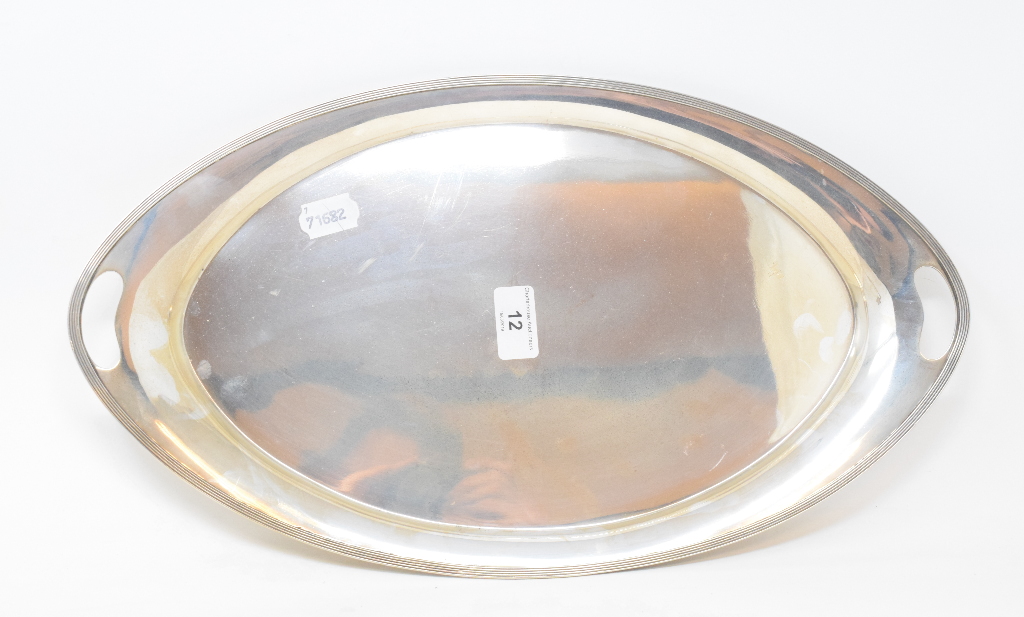 A silver two handled tray, of navette form, with a reeded border, Sheffield 1966, approx. 27.7