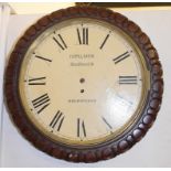 A wall clock, the 33 cm diameter painted dial with Roman numerals, fitted a single fusee movement,