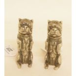 A modern pair of silver condiments, in the form of dogs, London 1990, approx. 11.9 ozt, 7 cm high (
