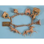 A 9ct gold bracelet, with assorted charms and three seals See illustration Report by RB Total weight