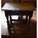 An oak joint stool, with carved decoration, 46 cm wide