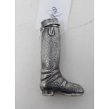 A novelty silver riding boot vesta case Modern