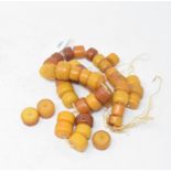 A string of amber type beads, 70 cm