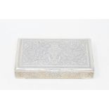 A Persian style silver coloured metal box, decorated flowers and foliage, 14 cm wide, other assorted