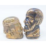 Two brass vesta cases, in the form of heads Modern