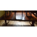 A Victorian mahogany extending dining table, inset an extra leaf, on tapering turned legs, 199 cm