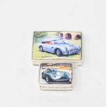 Two silver and enamel car themed pill boxes Modern