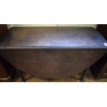 A George III mahogany dropleaf table, on pad feet, 140 cm wide