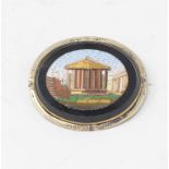 An Italian micro-mosaic oval brooch, in a yellow coloured metal mount, 5 cm wide