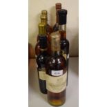 A bottle of Chateau Coutet a Barsac Premier Grand Cru De Sauternes, 1966, and eight other pudding