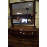 A Victorian mahogany toilet mirror, on a bow front base with three drawers, 50.5 cm wide