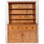 A stripped pine dresser and plate rack, 158 cm wide See illustration