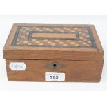 A carved wood chess set, in an inlaid box, 18 cm wide Report by GH One of the black pawns is a