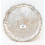 A George III silver salver, crested, and with engraved decoration, London 1798, approx. 15.8 ozt,