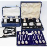 A silver condiment set, Birmingham 1935, cased, a set of coffee spoons, and two other sets, all