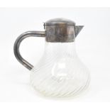 A glass and silver plated lemonade jug, with a removable glass tube for ice, 24 cm high