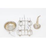 A pair of silver toast racks, Sheffield 1915, a silver funnel and a silver strainer, approx. 6.5 ozt