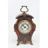 A Louis XVI style mantel clock, the 8 cm diameter dial signed Goldsmiths Company, Regent Street,