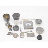 A silver vesta, initialled, Chester 1904, a silver cigarette case, a silver egg cup, approx. 5.5