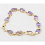 A 9ct gold and amethyst link bracelet