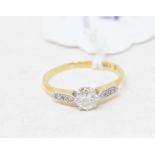 An 18ct gold and solitaire diamond ring, approx. ring size O Report by GH Gross weight approx. 2.1 g