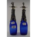 A pair of blue glass decanters, with plated mounts, 28 cm high Modern