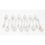 Twelve 19th century silver fiddle pattern teaspoons, initialled, various dates and makers, approx.