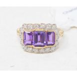 A 9ct gold and three emerald cut amethyst and diamond ring, approx. ring size O Modern