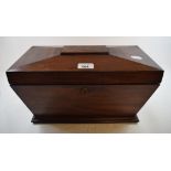 An early Victorian mahogany tea caddy, of sarcophagus form, 39 cm wide