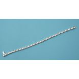 A 14ct white gold line bracelet, set 48 diamonds, with an approx. weight of 7.5ct See back cover