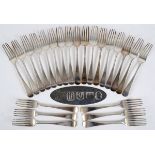 A set of 23 early 19th century silver Old English pattern table forks, initialled D beneath a
