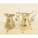 A George III style silver cream jug, London 1874, and another similar, approx. 5.9 ozt (2)