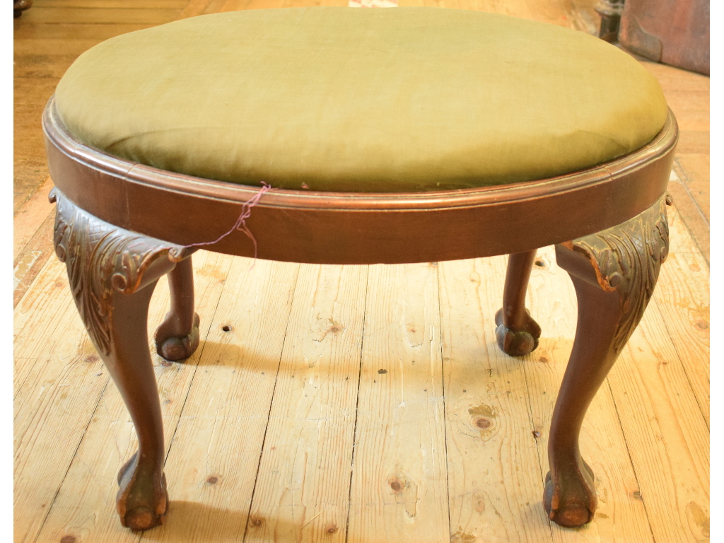 A mahogany stool, on cabriole legs, 70 cm wide