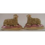 A pair of Staffordshire pottery sheep, 9 cm high, a pair of vases and a pair of stools (6)