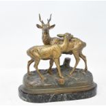 A bronze group, of a stag and doe, after Alfred Dubucand, on a marble base, 21 cm high