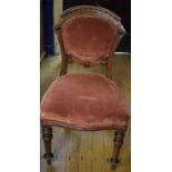 A set of six Victorian mahogany dining chairs, on turned and fluted front legs