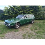 A 1979 Reliant Scimitar GTE SE6A, registration number BPE 820T, chassis number 8M61/18204617, green.