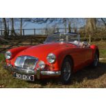 A 1956 MG A Roadster 1500, registration number 901 EKX, Chariot red. The all new MG A was launched