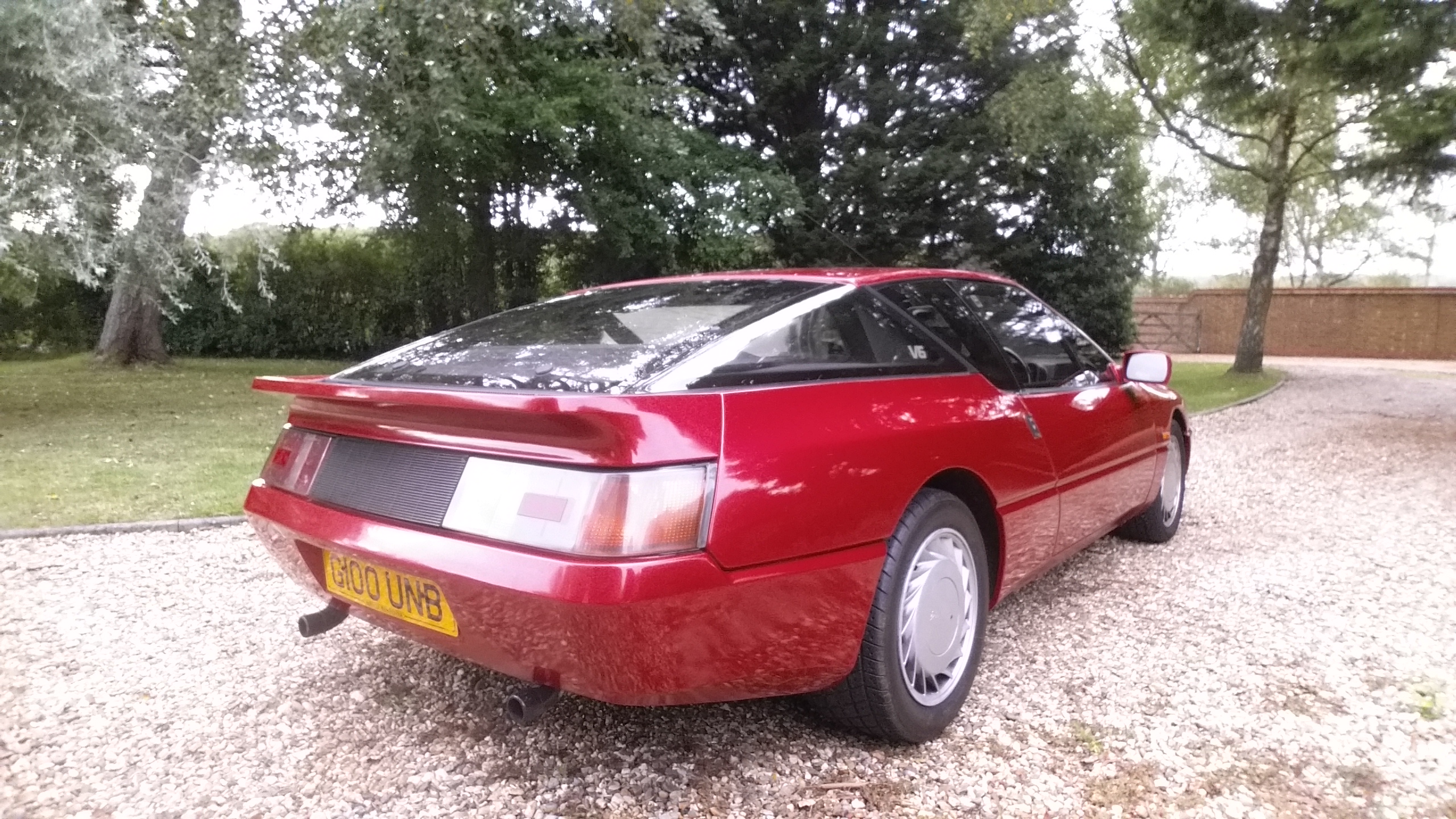 A 1990 Renault Alpine GTA V6, registration number G100 UNB, red. Introduced in 1984, the GTA was the