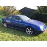 A 1997 Vauxhall Calibra V6 Coupé, registration number P614 NRP, blue. This V6 Calibra will be
