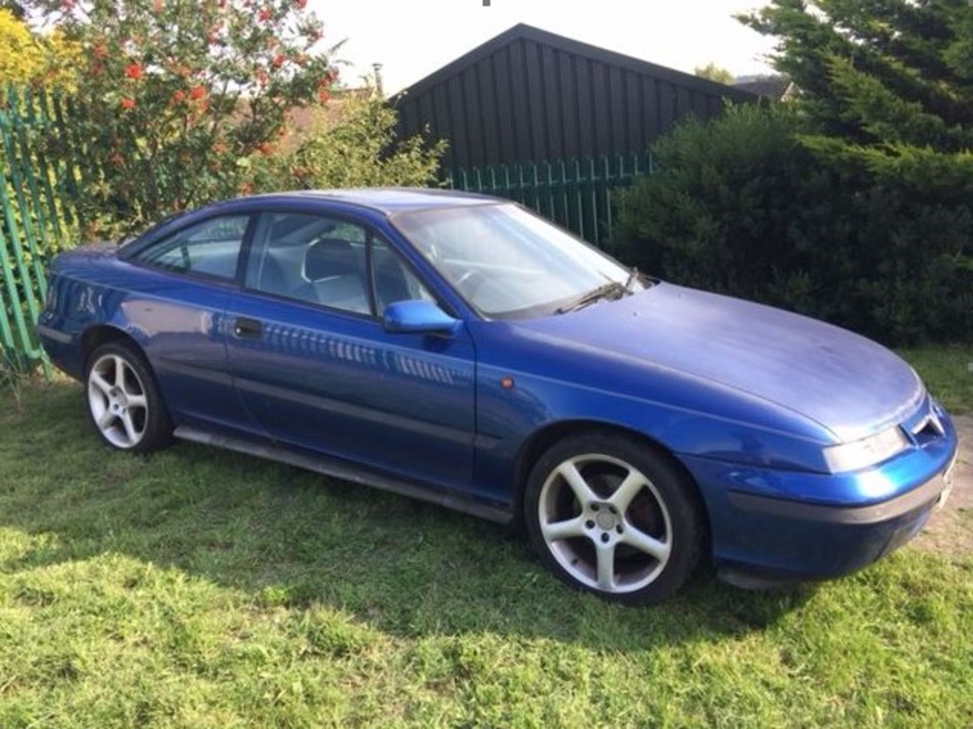 A 1997 Vauxhall Calibra V6 Coupé, registration number P614 NRP, blue. This V6 Calibra will be
