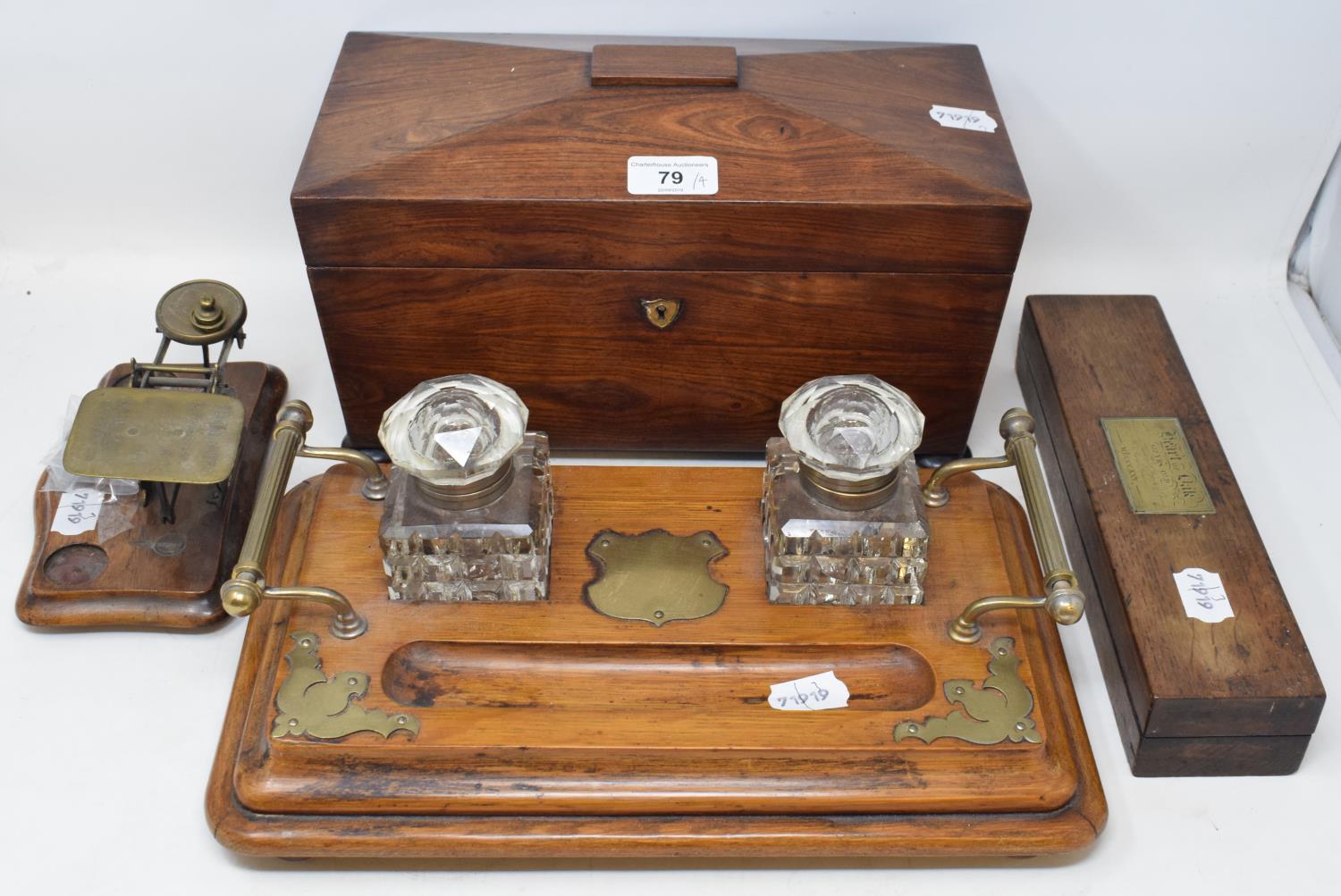 A Victorian rosewood tea caddy, of sarcophagus form, 32 cm wide, an oak box, with a brass plaque