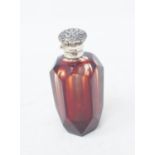 A silver coloured metal mounted coloured glass scent bottle, 7 cm high Modern